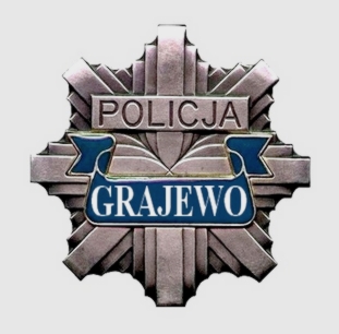 Logo Policji - szara gwiazda na jasnym  tle z napisem Grajewo na niebieskim tle